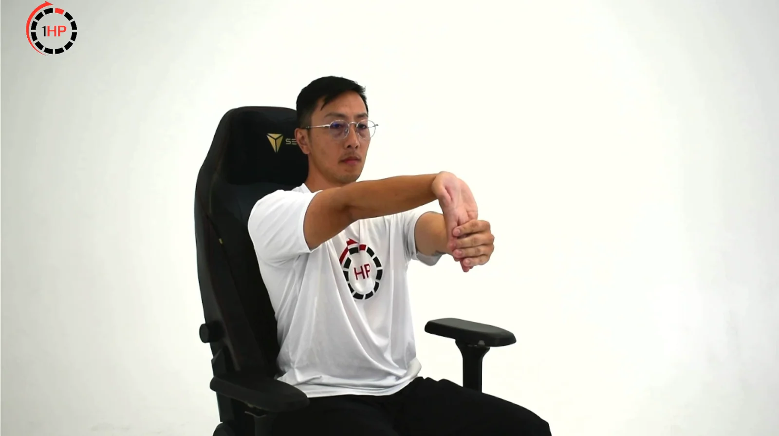 Computer-related golfer's elbow wrist flexor stretch with the elbow straight and palm facing up