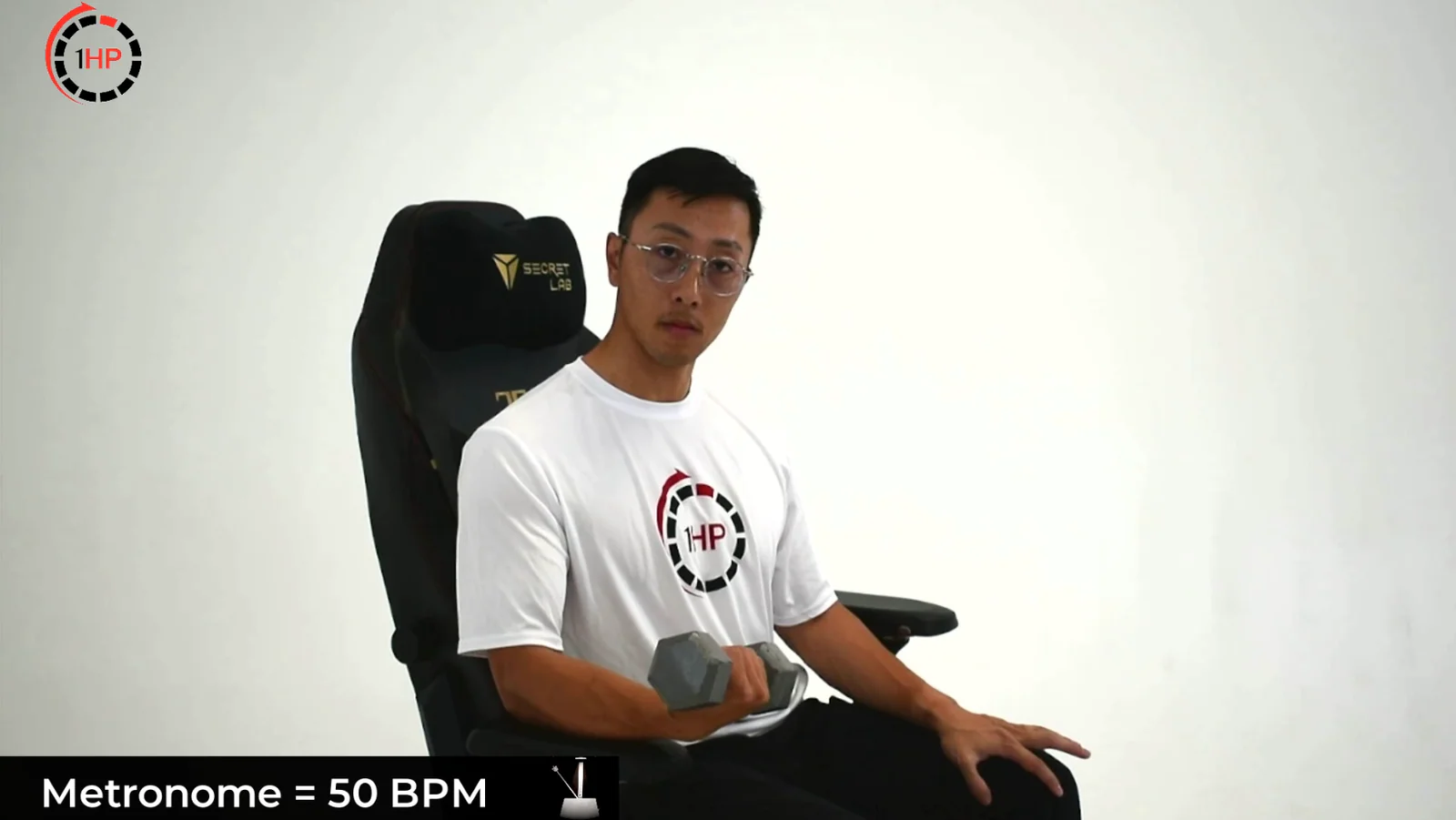Computer-related golfer's elbow metronome-paced wrist flexion with a dumbbell and palm facing up